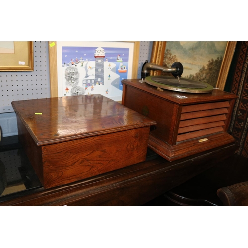 286 - Oak cased Zonophone Record Player with hood and retailers mark for W Howlett & Son