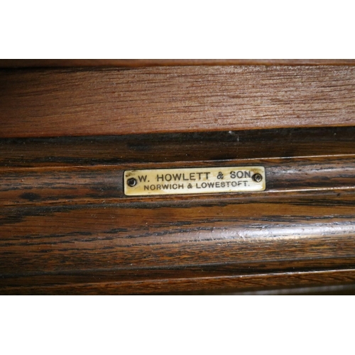 286 - Oak cased Zonophone Record Player with hood and retailers mark for W Howlett & Son