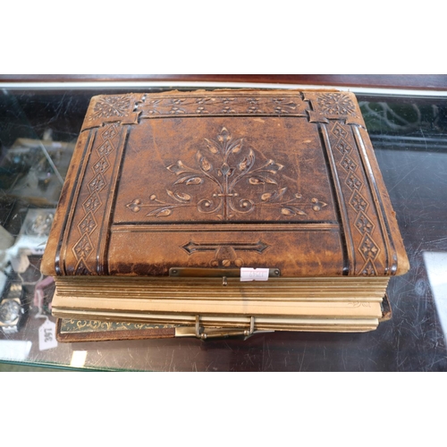 92 - Leather bound Sepia Photograph album depicting 19thC and later