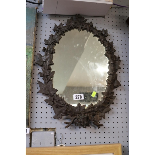 276 - Interesting Cast Iron foliate wall mirror in the style of Coalbrookdale