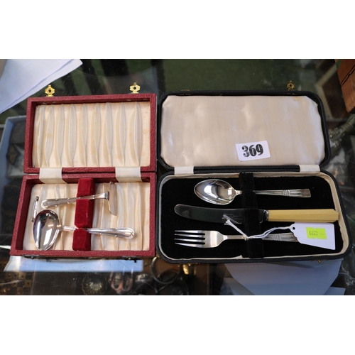 369 - Cased Silver Christening set with bone handled knife and a Cased Childs Pusher and spoon