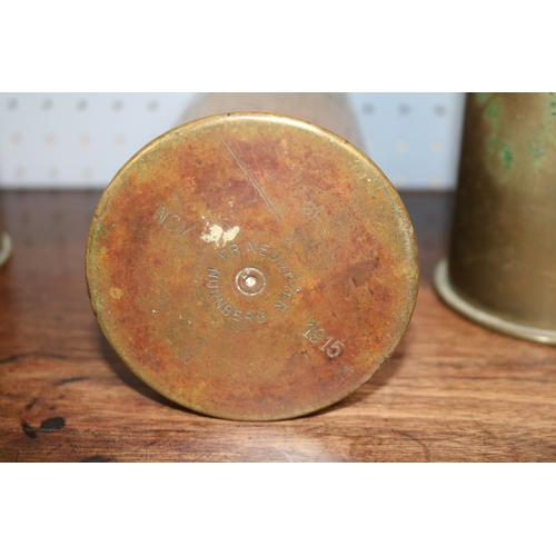 288A - WW1 Ottoman shell case and two smaller shell casings.