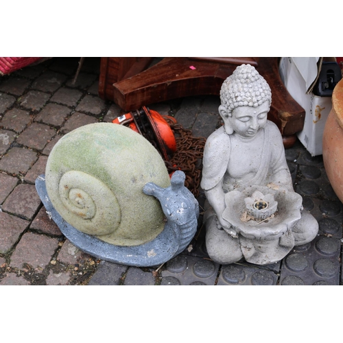 627 - Concrete Buddha and a Model of a Snail