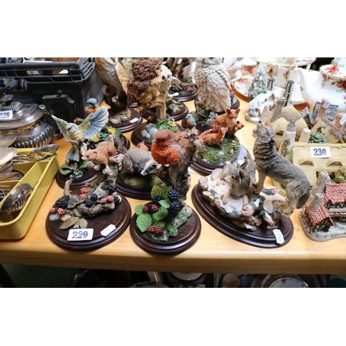 145 - Collection of assorted Country Artist figures to include Barn Owls, Wolf Pair etc