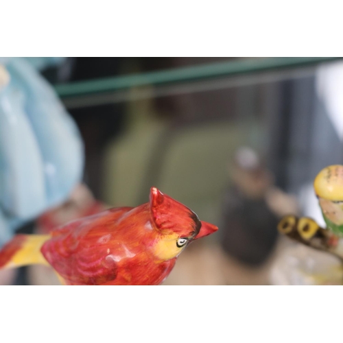 116 - Royal Doulton Cardinal Figure and a Royal Doulton Budgerigar