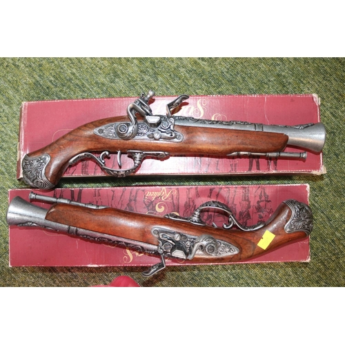 268 - Collection of assorted Novelty Knives and blades and a Pair of Boxed Replica Flintlock pistols