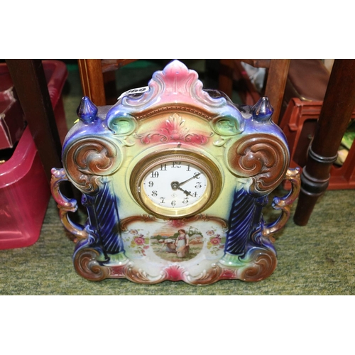 269 - European Ceramic mantel clock and a collection of Silver plated tableware