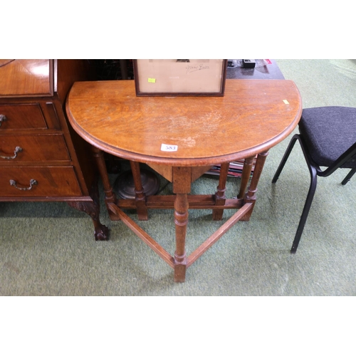 583 - Oak corner drop leaf Cricket type table with turned supports and straight stretchers