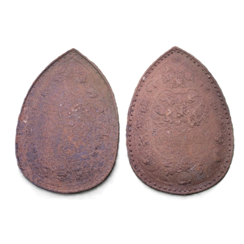 83 - Pair of 19thC Germanic cast Iron shields in the Renaissance manner. The central oval medallion, depi... 