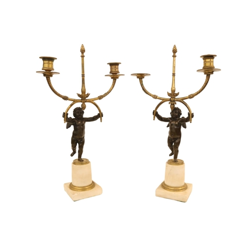 85 - A Pair of Marble and Ormolu Mounted Two Branch Candelabra Mid 19thC modelled as Bronze Putti standin... 