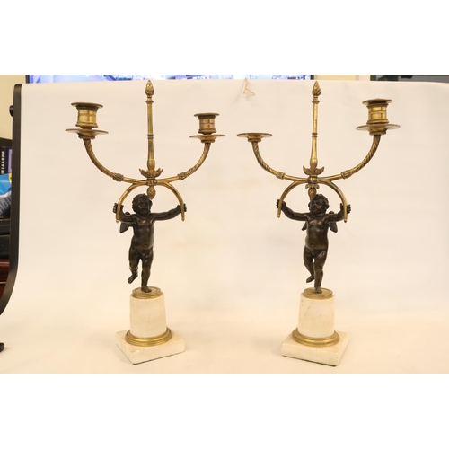 85 - A Pair of Marble and Ormolu Mounted Two Branch Candelabra Mid 19thC modelled as Bronze Putti standin... 