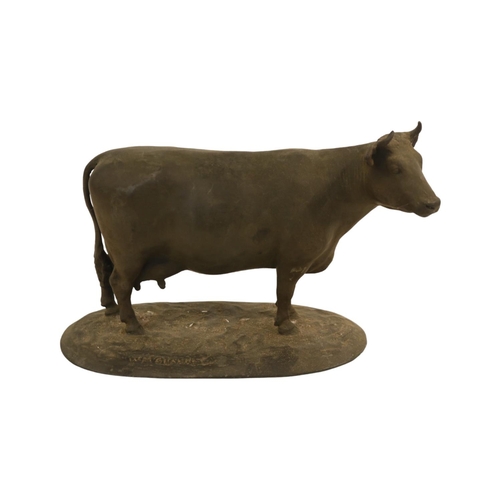 87 - Early 20thC School Bronze Model of a Cow on oval base marked W M Chance. 24cm in Length