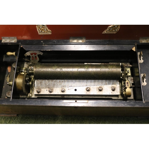 98 - 19thC Inlaid Swiss Cylinder Music box of six Airs in need of restoration. 59cm in Length