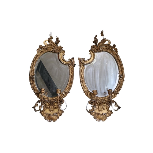 183 - Pair of Gilt Gesso George III Wall mirrors with candle holders, shaped bevelled mirror and foliate g... 