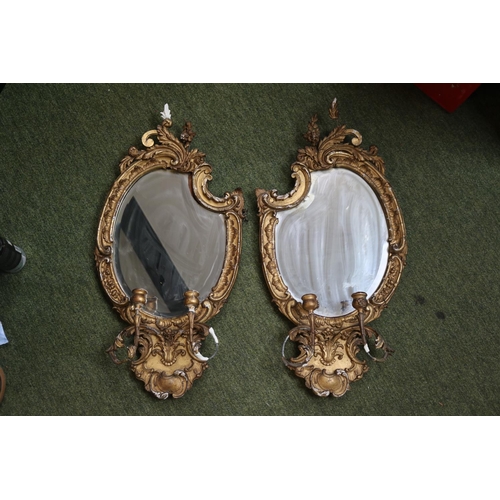 183 - Pair of Gilt Gesso George III Wall mirrors with candle holders, shaped bevelled mirror and foliate g... 