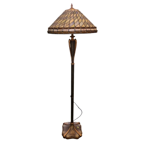 188 - Art Nouveau Style Leaded standard lamp with urn type stem over chequered base. 150cm in Height