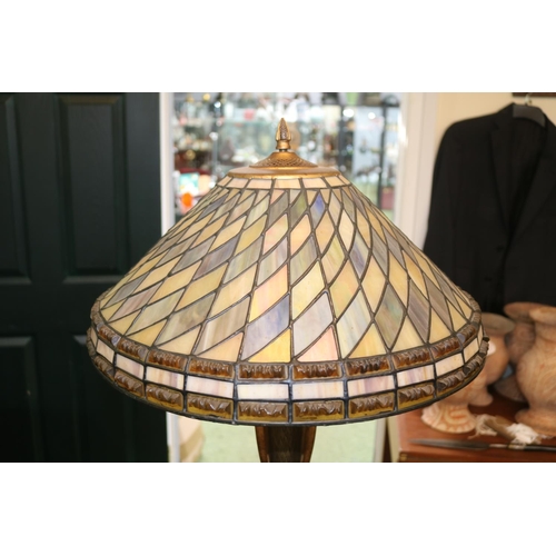 188 - Art Nouveau Style Leaded standard lamp with urn type stem over chequered base. 150cm in Height