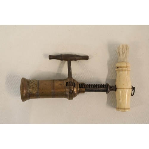 192 - 19thC English London Rack Corkscrew with turned bone handle with brush and hanging ring. Brass Barre... 