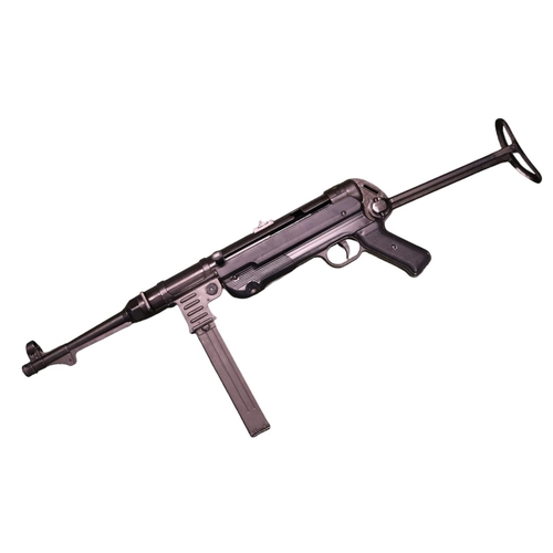 216 - A Denix reproduction metal MP40 Sub Machine Gun with magazine and strap with Y Strap