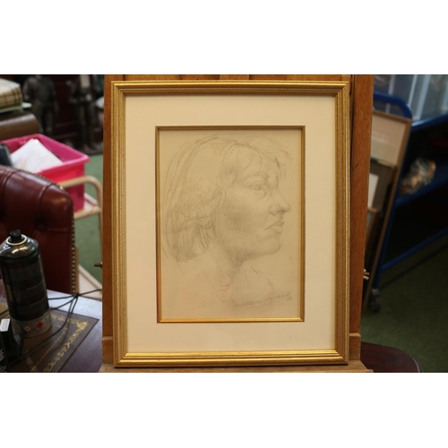 272 - Duncan Grant (Scottish, 1885-1978). Pencil sketch portrait of an unknown lady sitter signed and date... 