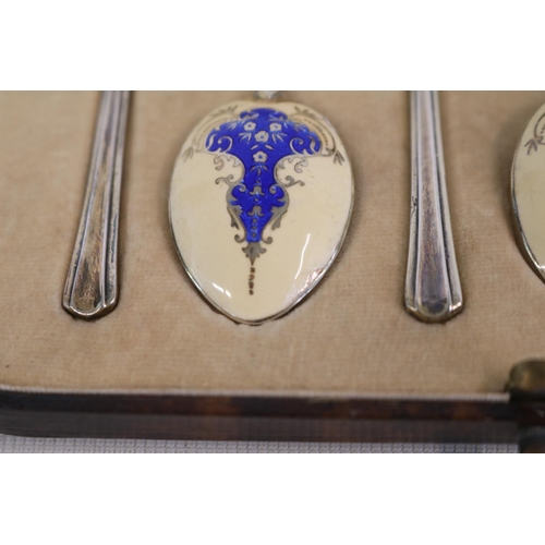 288 - Cased set of 6 Silver enamelled Teaspoons Birmingham 1913 65g and a Cased Set of Silver Enamelled Ma... 