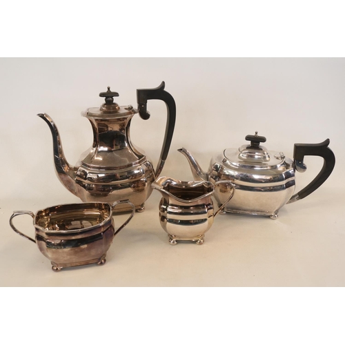 298 - 4 Piece Edwardian Silver Tea set with ebony handles and knops of panelled form supported on ball fee... 