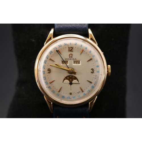 307 - Omega Moon phase day date 17 jewel manual wind watch circa 1952. (MOVEMENT SIZED)  Reference no 1338... 