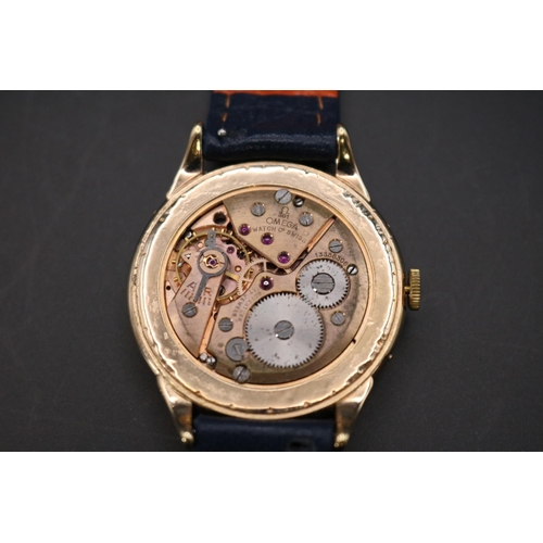 307 - Omega Moon phase day date 17 jewel manual wind watch circa 1952. (MOVEMENT SIZED)  Reference no 1338... 