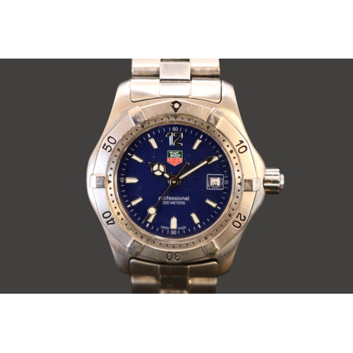 310 - Tag Heuer Professional 200m ladies Swiss quartz watch with date window and blue dial. 30mm case size... 