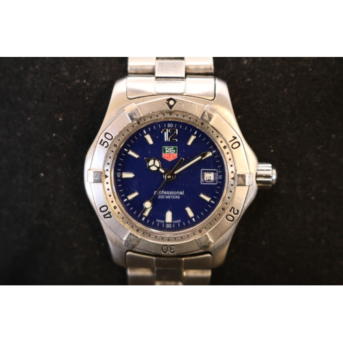 310 - Tag Heuer Professional 200m ladies Swiss quartz watch with date window and blue dial. 30mm case size... 