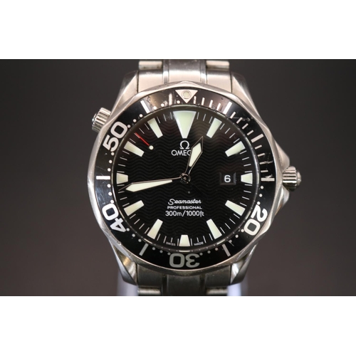 315 - Omega Seamaster Professional 300m, Swiss quartz movement with black enamelled bezel and dial. 41mm c... 