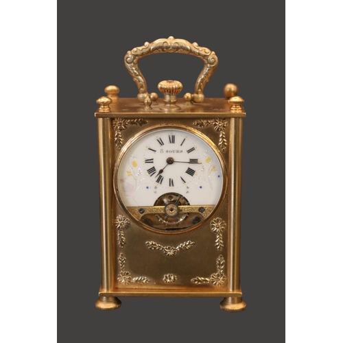 317 - Edwardian gilded travelling clock fitted with 8 Day Hebdomas 8 day movement. The Case embossed with ... 