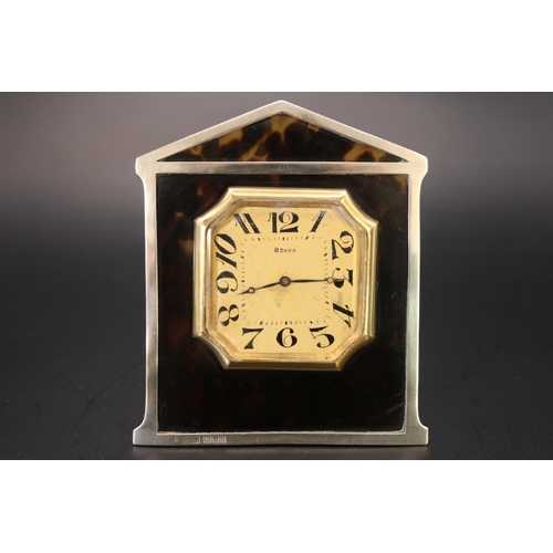 318 - Tortoiseshell Silver mounted 8 Day easel clock with numeral dial Hallmarked London 1924. 10cm in Hei... 