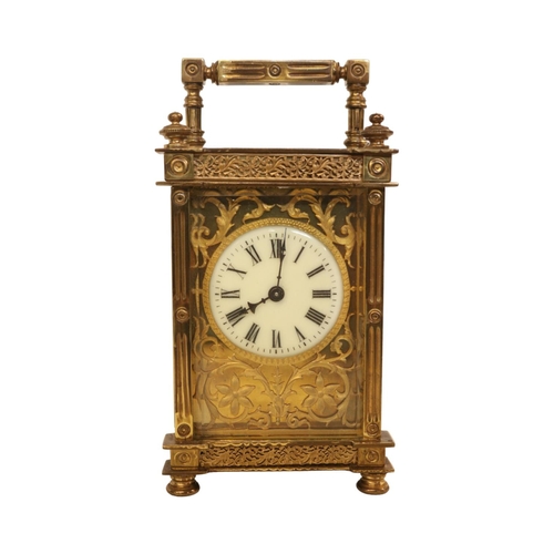 330 - Late 19thC Brass Carriage clock with floral Fretwork front Roman numeral Dial. 150mm in Height