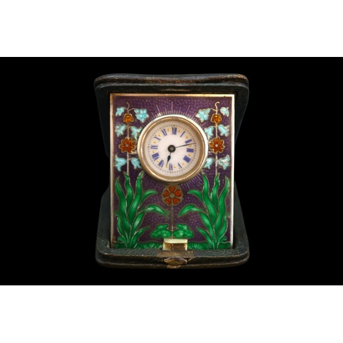 333 - Edwardian Silver and Guilloche travelling clock with roman numeral and floral decorated case within ... 