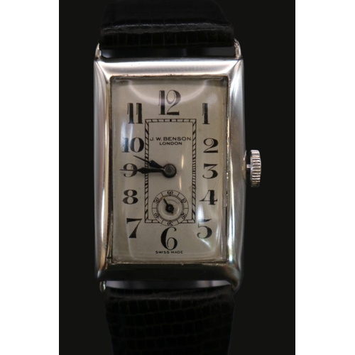 334 - J W Benson of London Swiss Silver rectangular cased wristwatch on Leather strap. 24mm Case