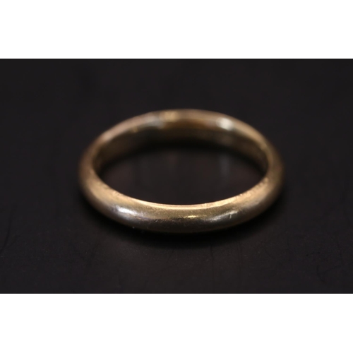 360 - 18ct Gold Tiffany & Co Court Shaped wedding band with inscription to interior. Size M, 4.4g total we... 