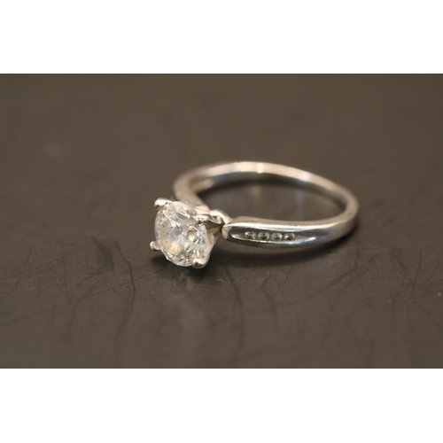 363 - Ladies 14KT White Gold Diamond Solitaire ring. 1.31ct (6.86mm) G I1 mounted on 14KT white gold shank... 