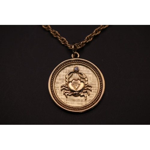 368 - Zodiac design 18ct Gold Circular Diamond set Pendant on chain. Circular pendant with applied Crab mo... 