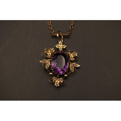 369 - 9ct Gold Edwardian Oval Amethyst Pendant with Foliate seed pearl setting. Oval Facetted Amethyst 15m... 