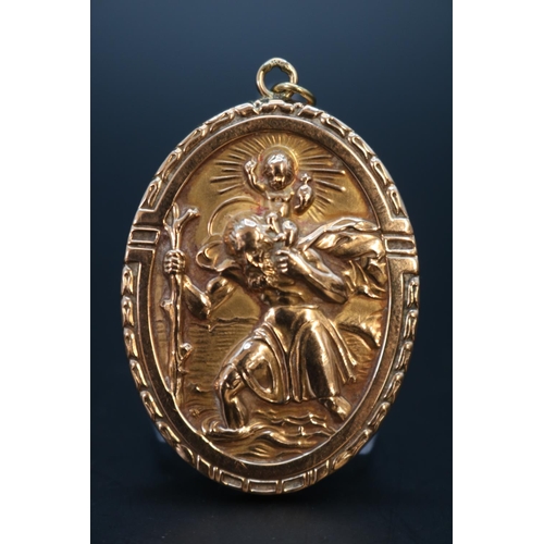 377 - Oval 9ct Gold Italian Grand Tour style St Christopher on hoop 45mm in Height. 9.4g total weight