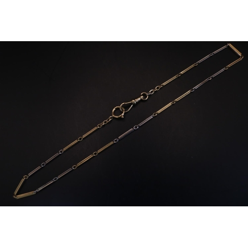 387 - 18ct Two tone gold bar link necklace with lobster link clasp 38cm in Length. 12.4g total weight