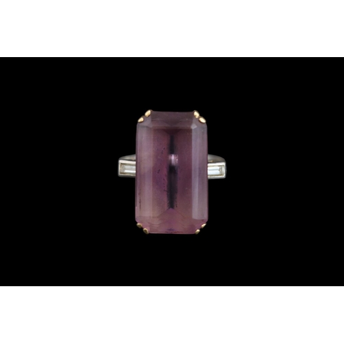 396 - Good Quality Amethyst Platinum & 18ct Gold Rectangular Facetted Stone claw set, flanked by Rub over ... 