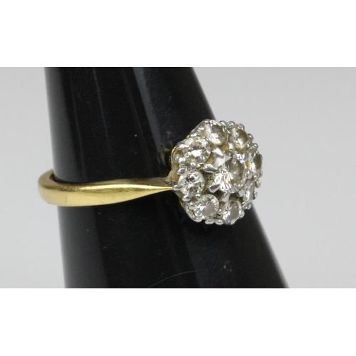 406 - 18ct Gold & Platinum Nine Diamond Set Ring Est 1.00CT. A simply stunning 18ct gold & platinum 9 diam... 