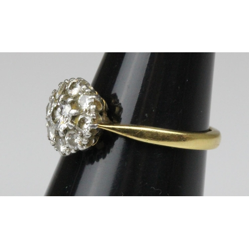 406 - 18ct Gold & Platinum Nine Diamond Set Ring Est 1.00CT. A simply stunning 18ct gold & platinum 9 diam... 