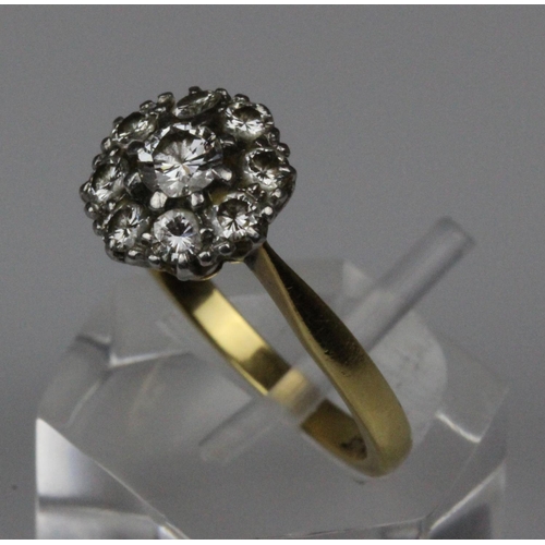 406 - 18ct Gold & Platinum Nine Diamond Set Ring Est 1.00CT. A simply stunning 18ct gold & platinum 9 diam... 