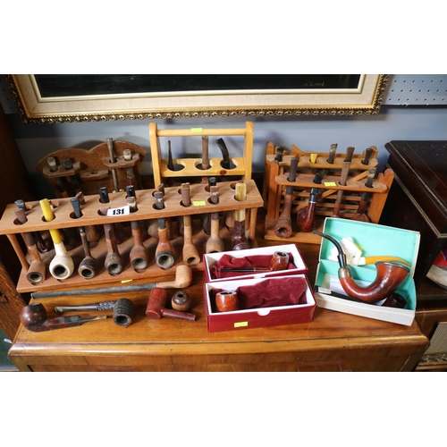 131 - Collection of assorted Pipes and Pipe racks to include Ogdens, Sherlock Holmes style etc