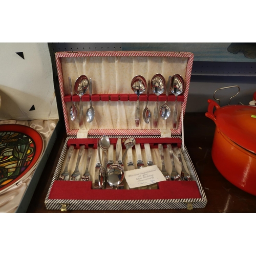 147 - Walnut cased Canteen of Cutlery and a 1950 Cased set of Cutlery