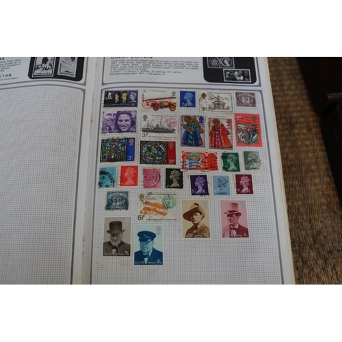 271 - 2 Albums of assorted World Stamps and assorted Loose Stamps