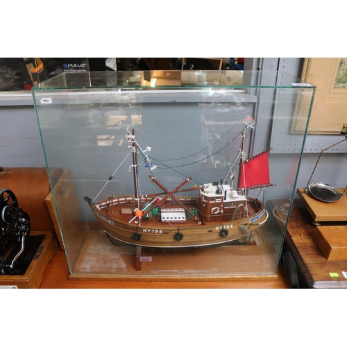 Large Scratch Built Fishing boat entitled Lady Pamela KY194 within glazed case. 60cm in Length